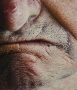 Detailed hyperrealistic oil painting of a mouth and lips by Jan Petrov.